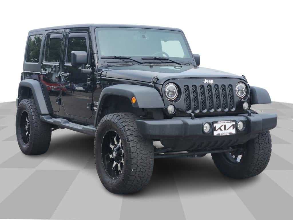 2014 Jeep Wrangler Sport in Black Clearcoat — front three-quarter view