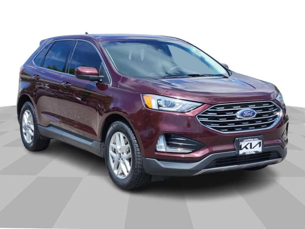 2021 Ford Edge SEL in Burgundy Velvet Metallic Tinted Clearcoat — front three-quarter view