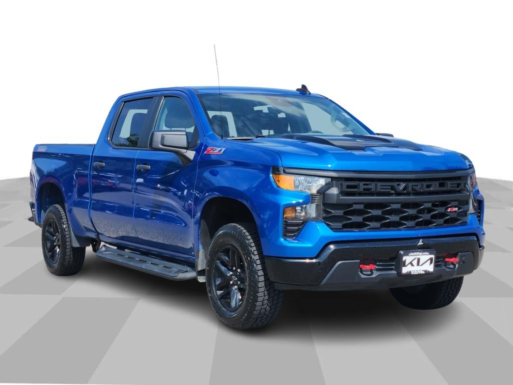 2022 Chevrolet Silverado Custom Trail Boss in Glacier Blue Metallic — front three-quarter view