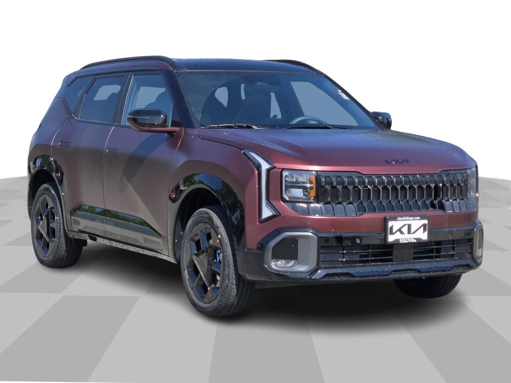 2027 Kia Seltos X-Line S in Magma Red Matte — front three-quarter view