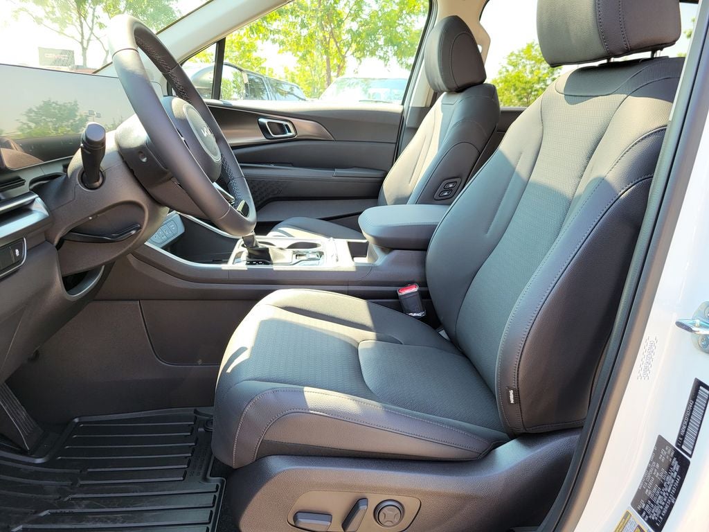2026 Kia Carnival — rear three-quarter view